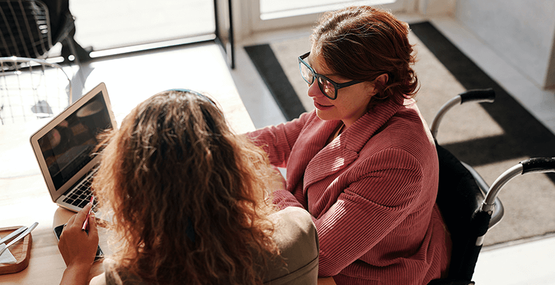 Two women having a discussion.